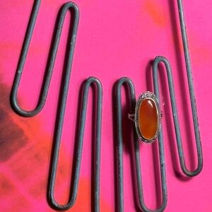 Sterling silver ring with orange gemstone